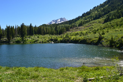 small lake and peak beyond