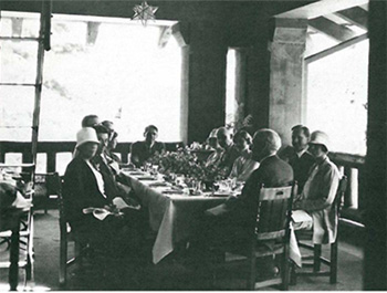 people sitting at a large table