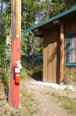 fire extinguisher on utility pole