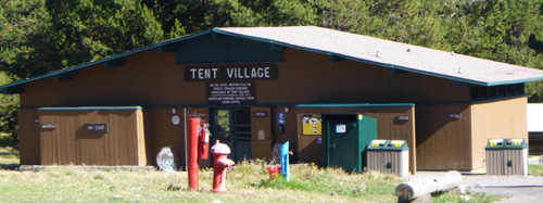 large building with sign that says Tent Village