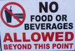 sign says no food or beverages allowed beyond this point