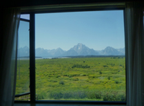 window with view of peaks