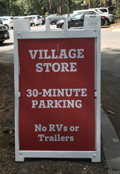 sign says Yosemite Village store 30 minute parking, no RVs or trailers