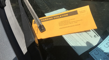 parking citation under windsheild wiper