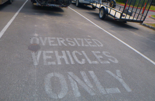 oversized vehicles only painted on parking space