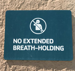 sign says no extended breath holding