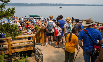 people lined up at a dock