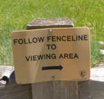 follow fenceline to viewing area right arrow