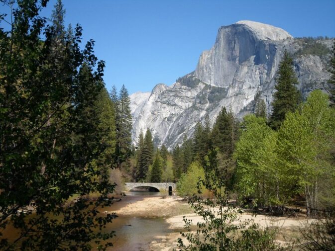 river flowing under bridge