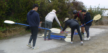 hosing off paddles after kayaking