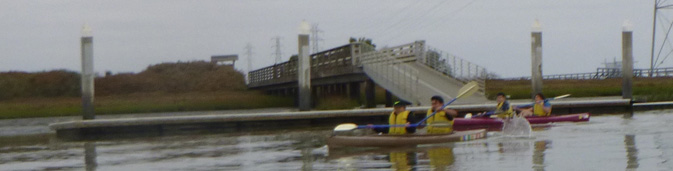 kayaks departing dock