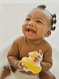 infant with rubber ducky