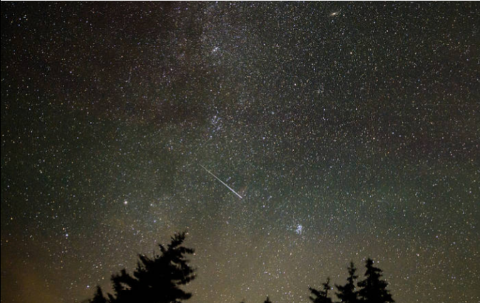 starry sky with a meteor streak