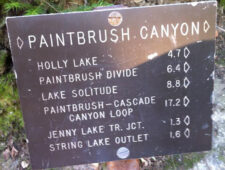 sign with distances on Paintbrush canyon trail
