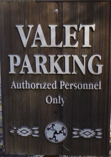sign says valet parking authorized personnel only