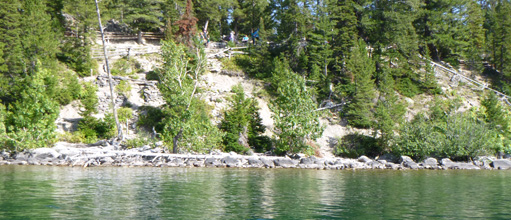 view up cliff from lake