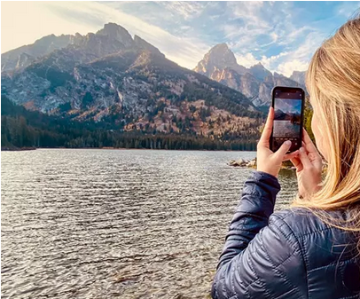 woman taking a cell phone photo
