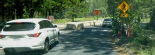 large concrete barrier to block and split road traffic