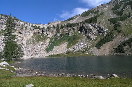 lake with mountain behind it