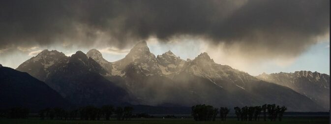 mountains with dark clouds above