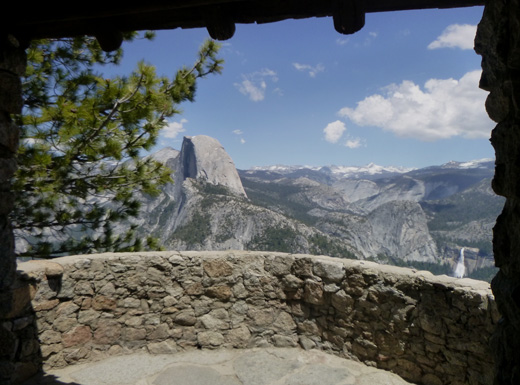 half dome seen through opening in stone building
