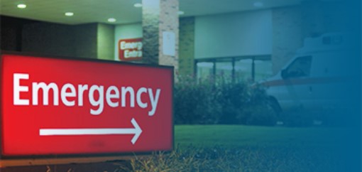 sign outside a hospital that says Emergency 