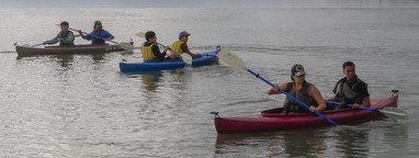 three tandem kayaks