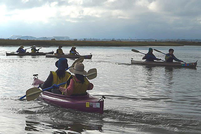 four tandem kayaks