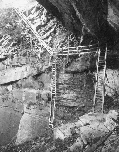 ladders up a cliff face