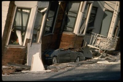 auto under collapsed building