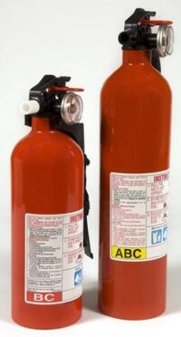 2 fire extinguishers, one labeled BC and one labeled ABC