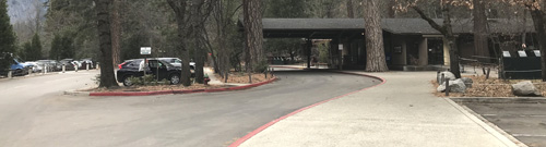 building with roofed driveway