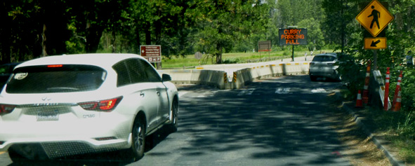 large concrete barrier to block and split road traffic