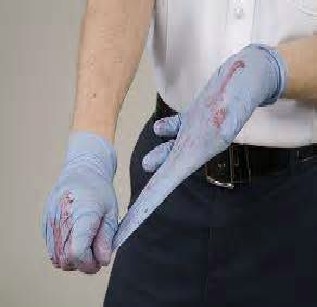 pulling glove off at fingertips