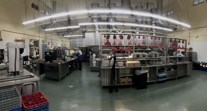wide view of commercial sized kitchen