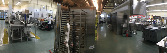 wide view of commercial sized kitchen