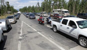 Vehicles lined up at West Entrance to Yellowstone National Park