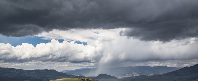 band of clouds with rain falling from center
