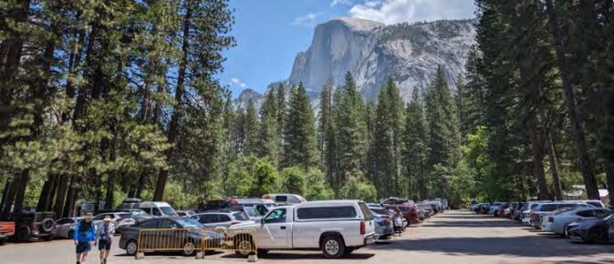 parking lot with Half Dome behind