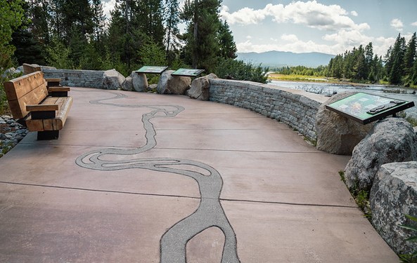 paved pathway with river design