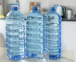 three plastic water bottles