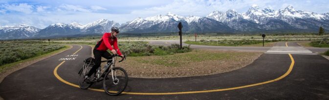 riding a bike on a paved pathway