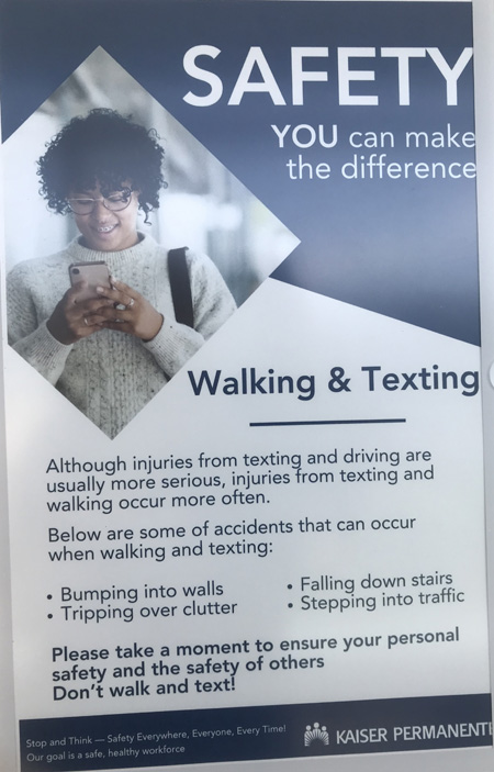 poster says don't walk and text