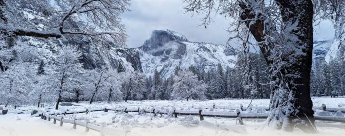 mountains and meadow in snow