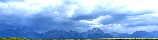 mountain range with storm clouds