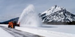 snow plow blowing snow 