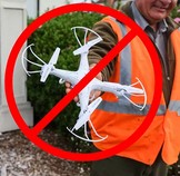 drone with a red circle and slash symbol to show it is banned in National parks
