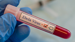 tube with liquid labeled ebola virus
