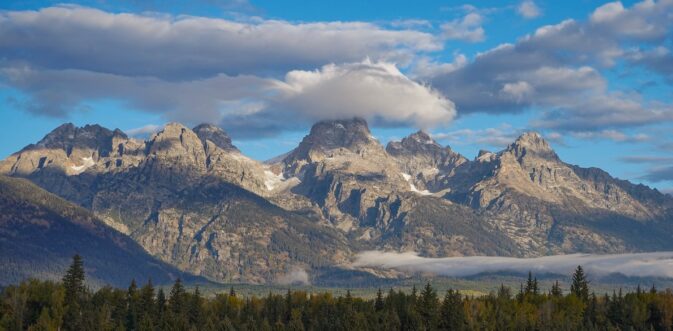 mountain peak with cloud on top
