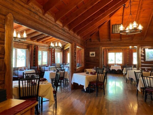 dining room with log walls